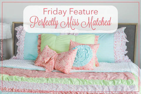 A straight on shot of a bed made with the Perfectly Miss Matched zipper bedding set.