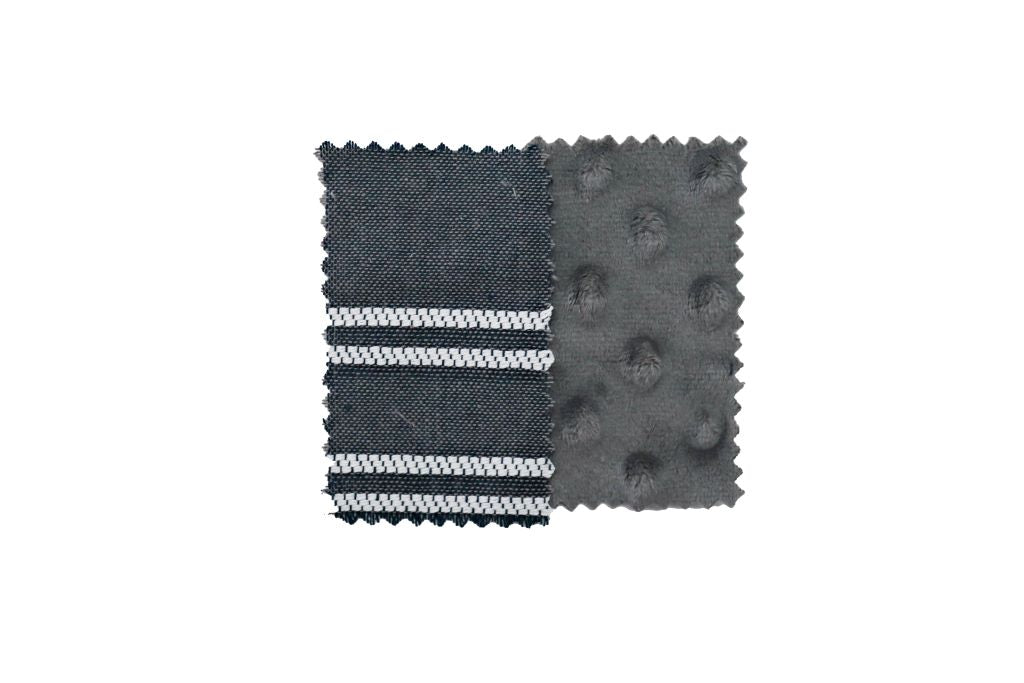 Fabric sample of fabric used for gray pillow with white stitching