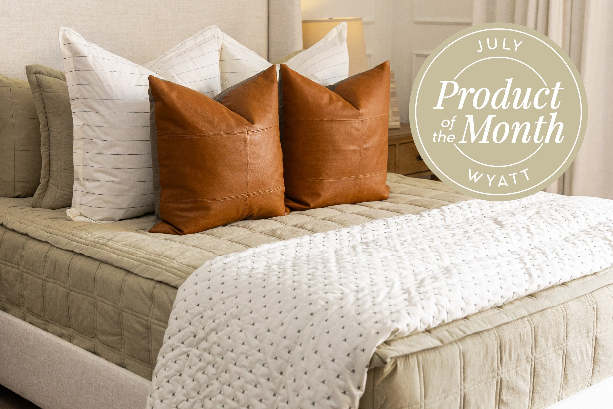 An infographic detailing the product of the month for July is Wyatt Luxe with the zipper bedding showcased.