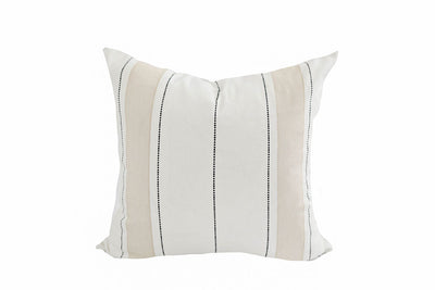 white, tan and charcoal striped pillow