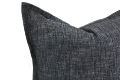 Close up of dark charcoal grey pillow cover 