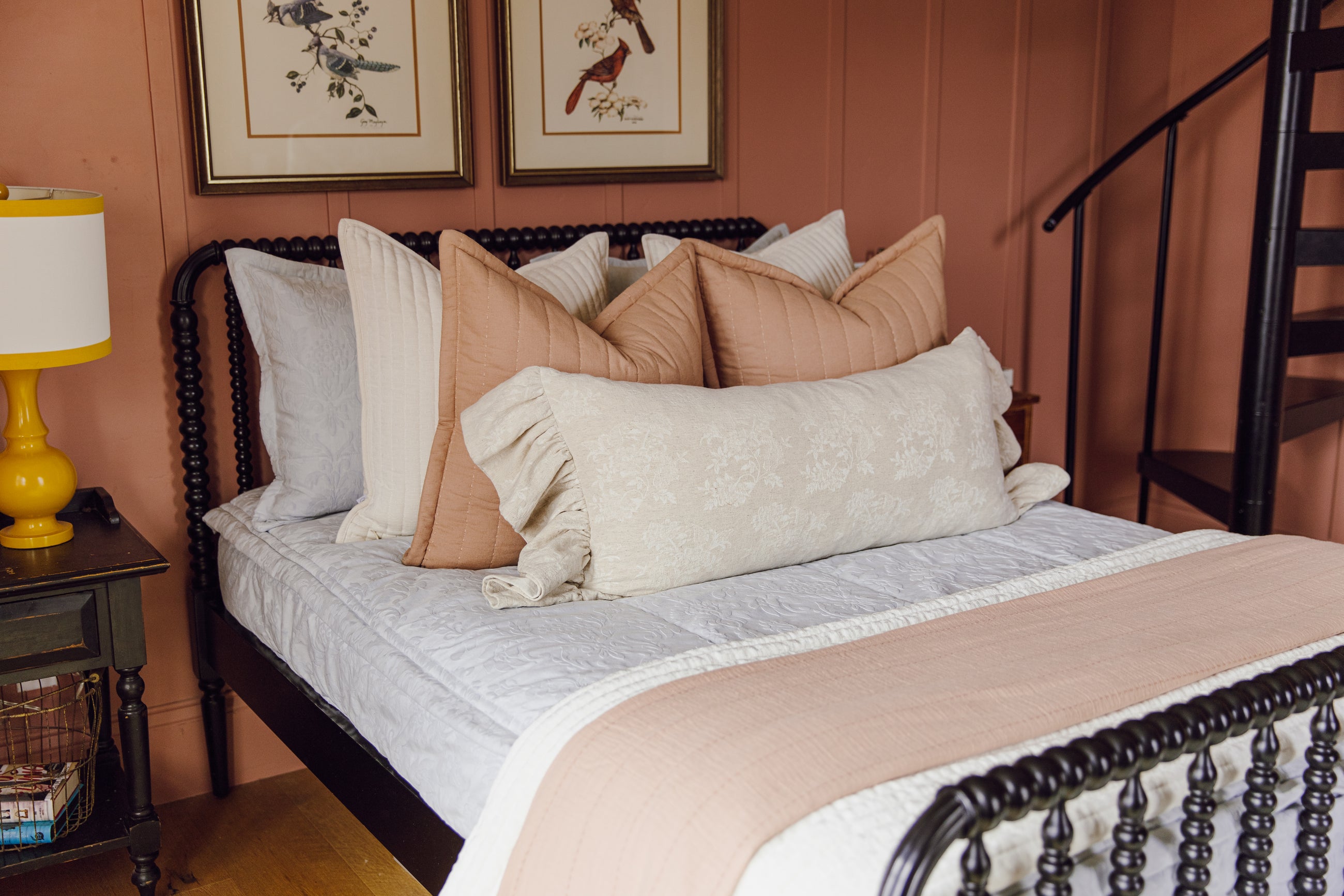 Light blue floral embossed zipper bedding with cream and terracotta accessories