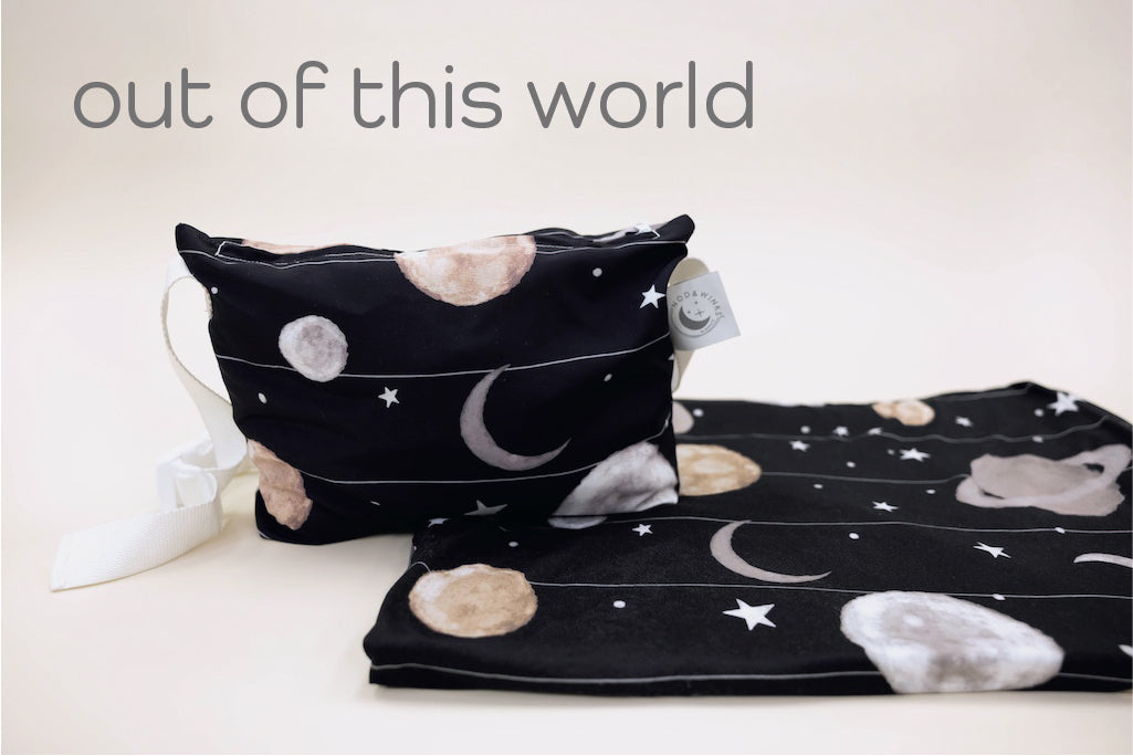 A child's space print blanket and coordinating zipper pouch