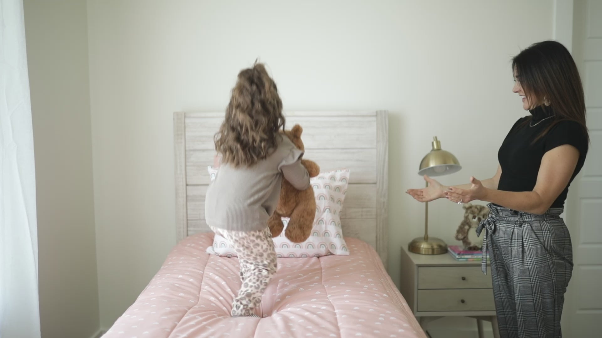 A video highlighting pink rainbow kids bedding and it's unique functionalities.