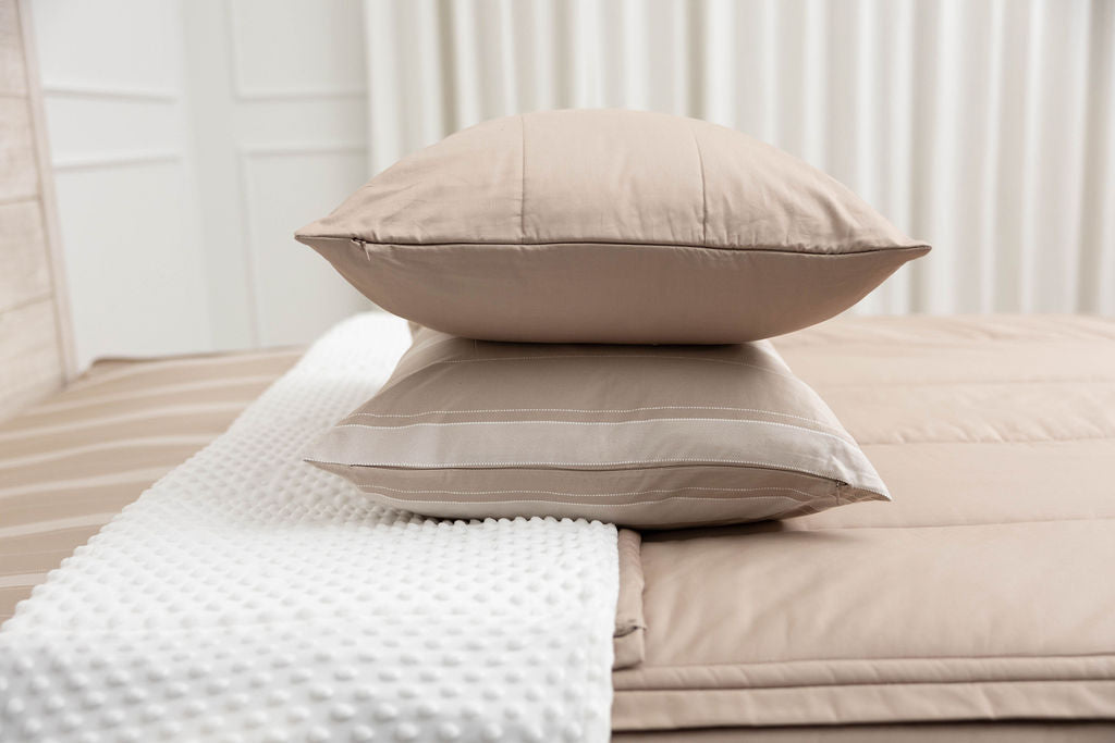 Tan zipper bedding with soft minky interior and coordinating pillowcases and shams