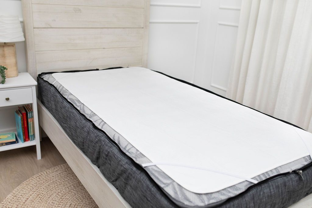 White absorbent accident bedding pad