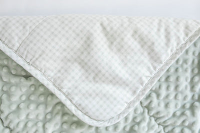White and green checkered mini blanket with green minky interior 
