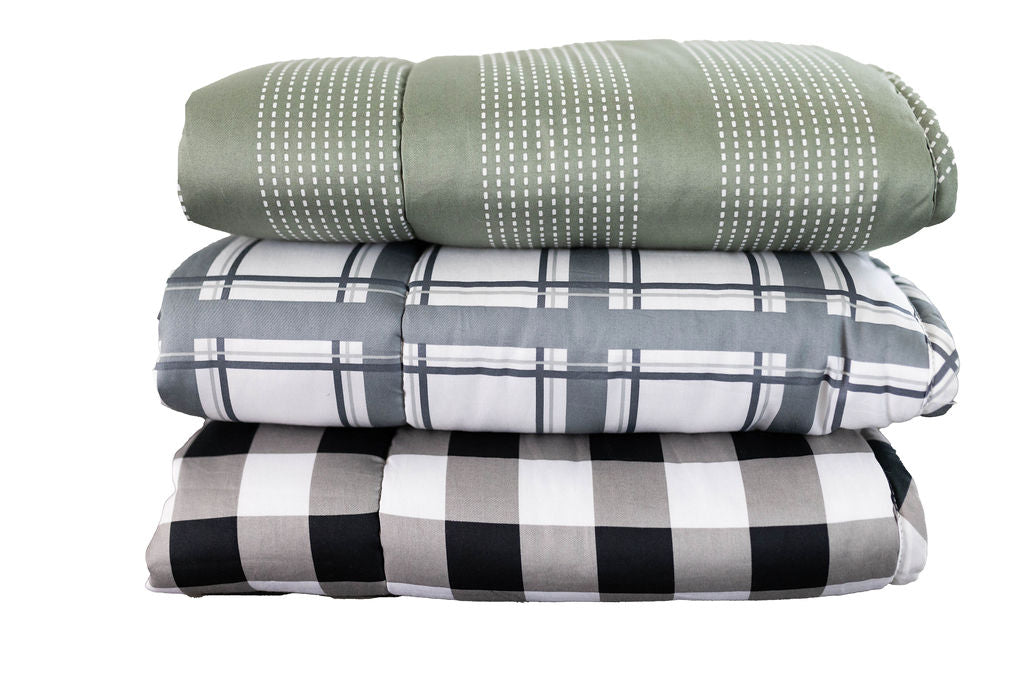 striped, plaid and checkered children's blankets stacked