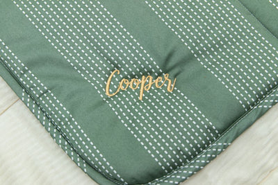 green dotted stripe children's blanket with tan embroidery