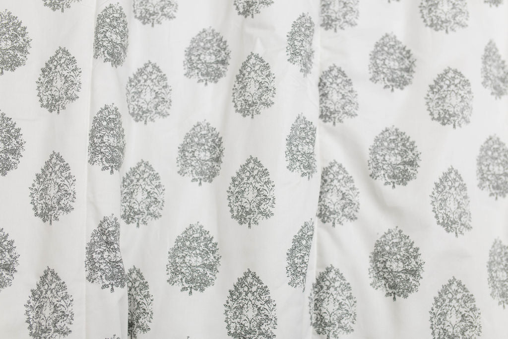 Cream blanket with gray floral design