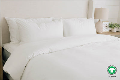 King bedroom with white organic sheet and comforter