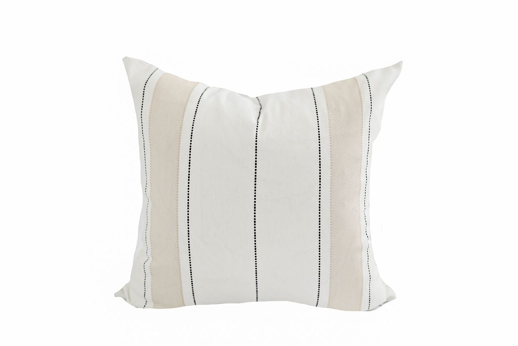 white, tan and charcoal striped pillow