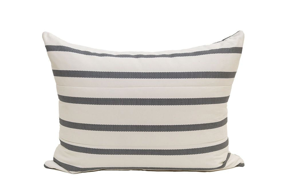A white and black striped sham pillow.
