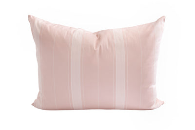 A pink striped pillowcase on a white background.