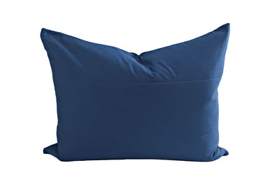 A navy blue pillow sham. 