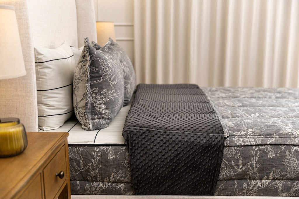 Side view of sketched floral zipper bedding.