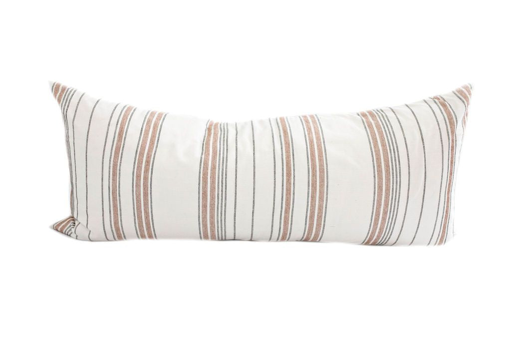 A cream with black and cognac stitched stripes extra large lumbar pillow on a white background.