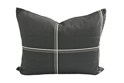 A charcoal pillow sham with a white and tan grid pattern design.