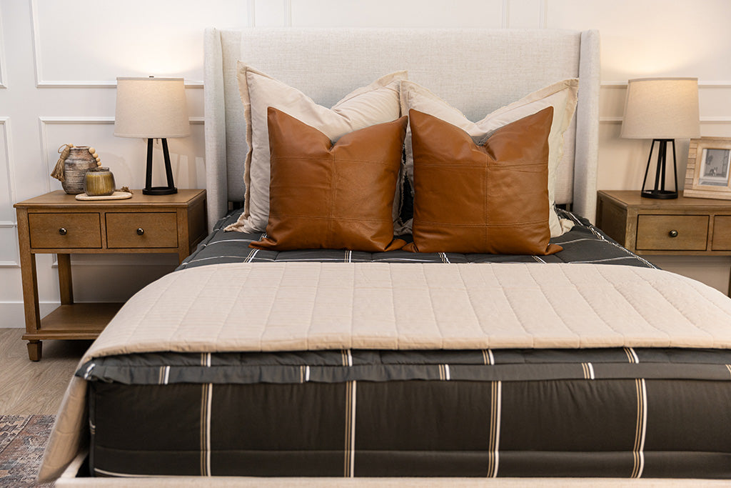 Charcoal plaid zipper bedding with tan, cream and rustic accessories.