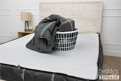 Charcoal with white and brown grid pattern bedding with zip out sheet