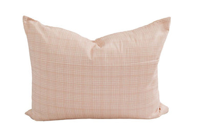 A peach sketched pillow sham on a white background.