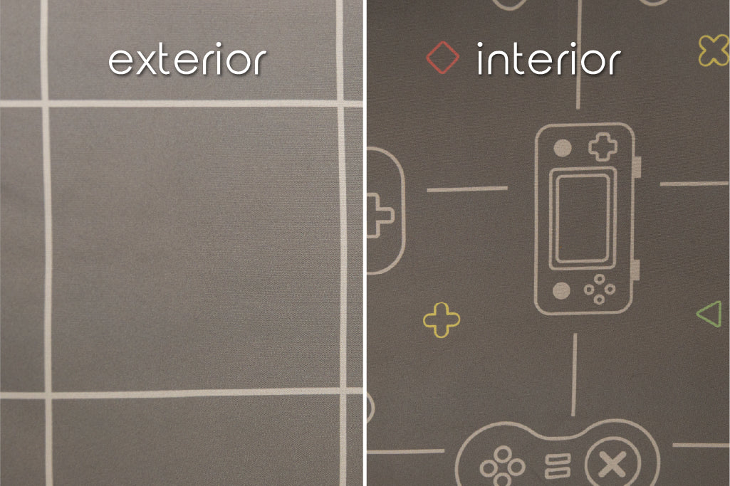 A close up of the exterior and interior fabrics of a set of gaming zipper bedding, showcasing the grid and game controller prints.