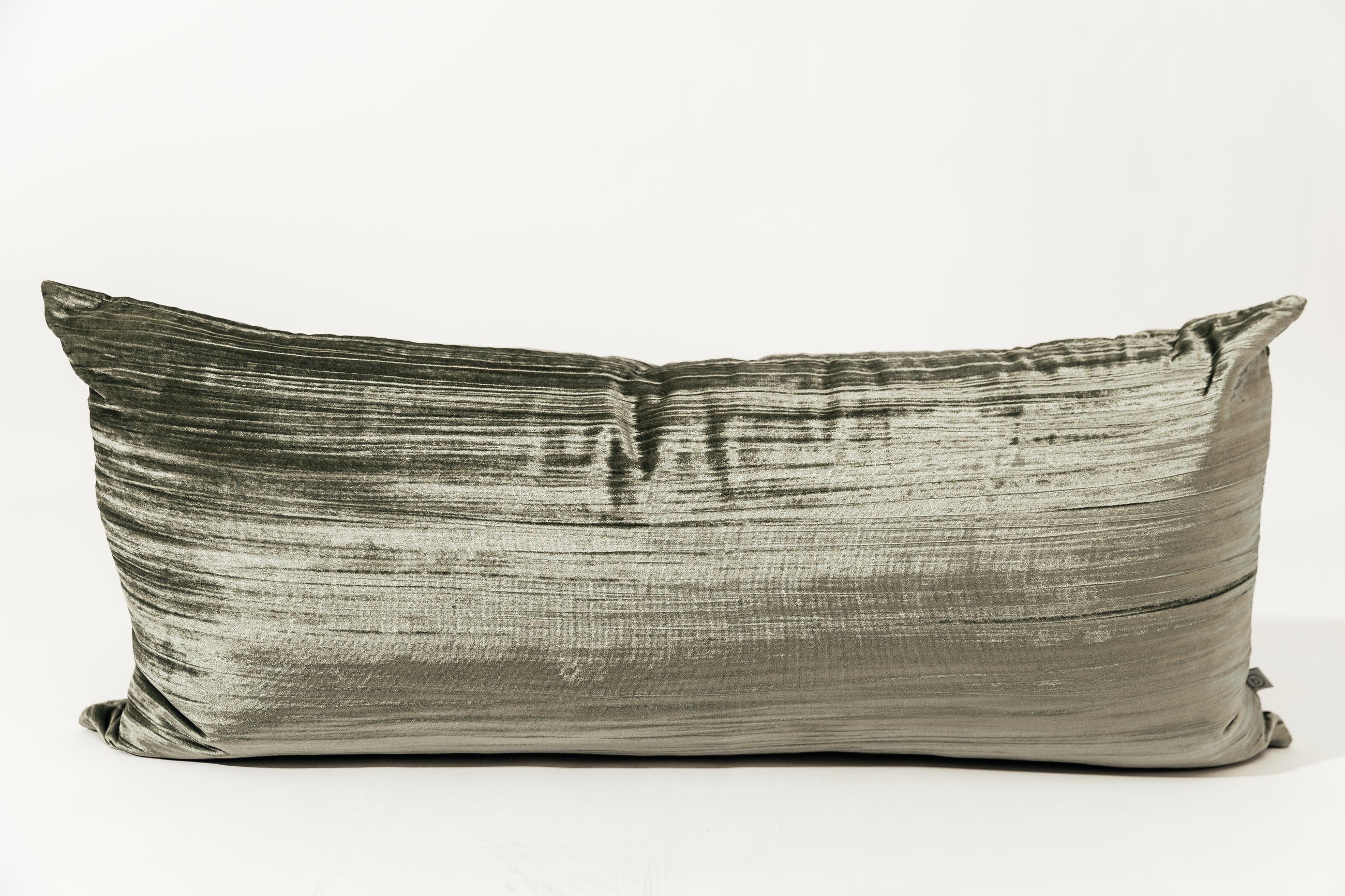 A green XL velvet lumbar pillow on a white background.