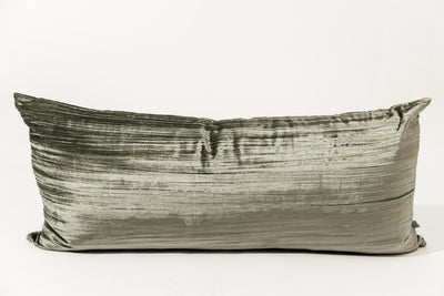 A green XL velvet lumbar pillow on a white background.