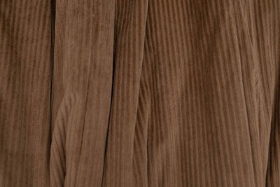 A close up of a softly texture brown minky blanket.