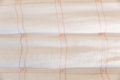 Blanket with white and pink grid pattern