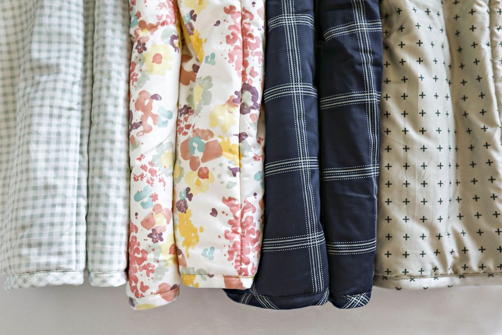 An assortment of designs and patterns for mini children's blankets.