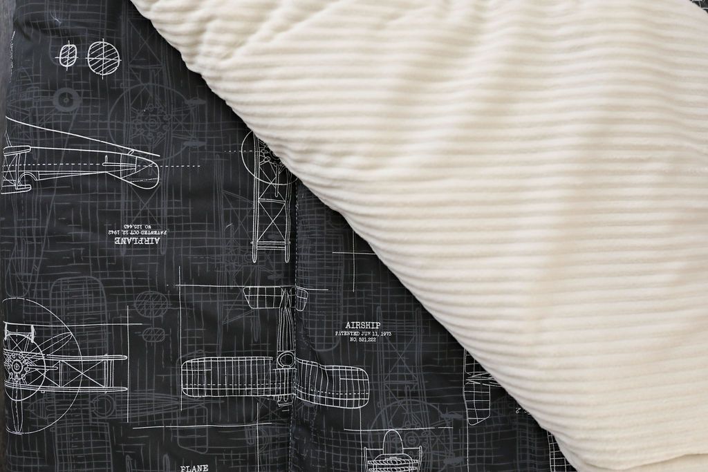 Charcoal airplane patterned blanket with cream minky striped blanket