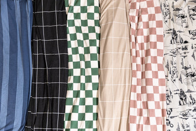 A close up view of all On-The-Go Travel blankets.