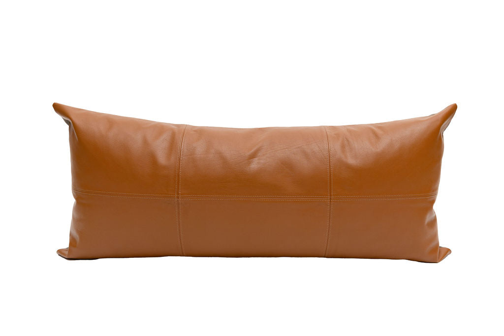 A brown leather extra large lumbar pillow on a white background.