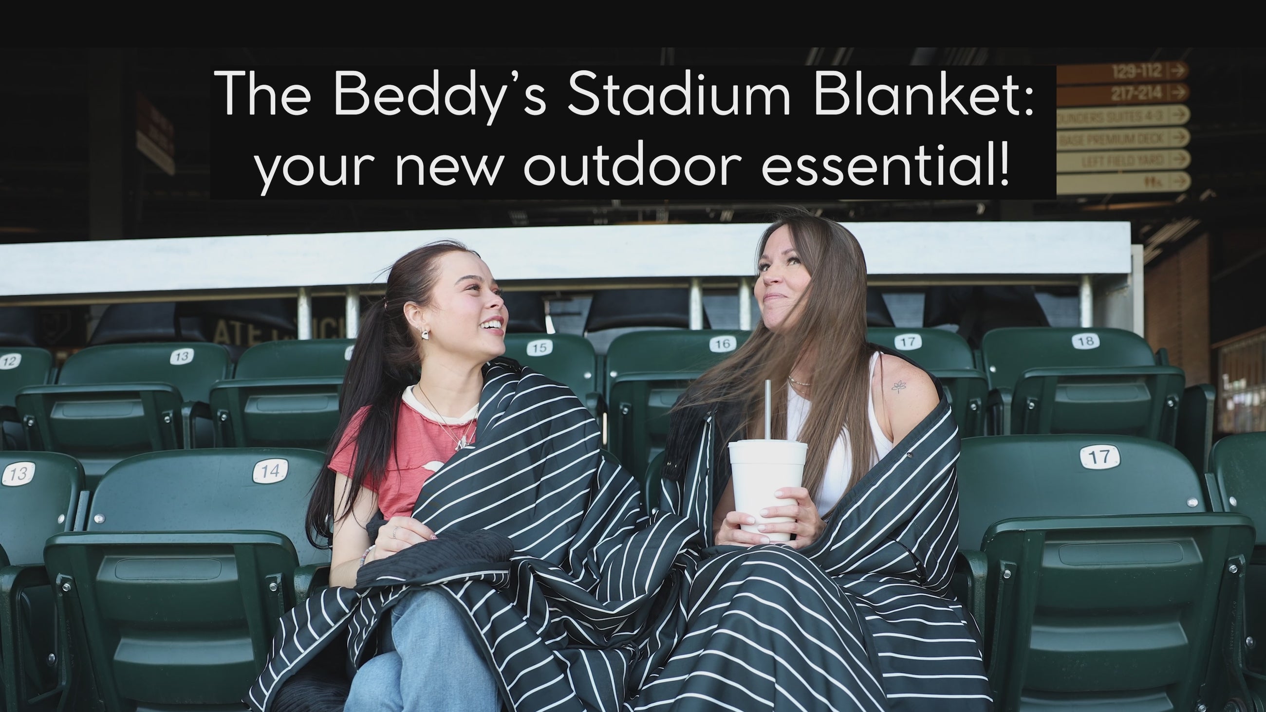 A video describing a stadium blanket that is water and wind resistant.