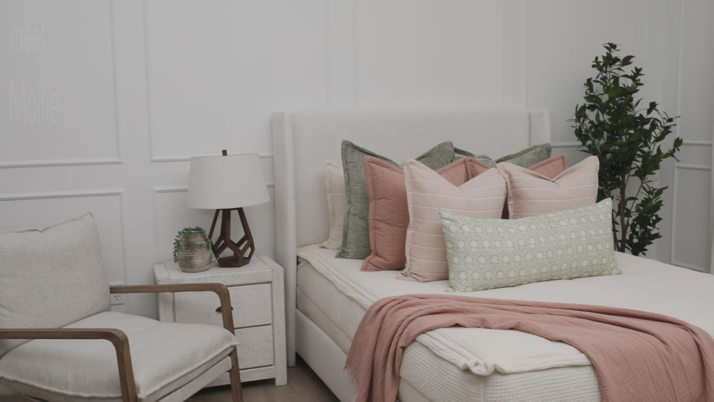 A video highlighting cream waffle textured zipper bedding and it's interior minky lining as well as how it can be adorned with neutral vibrant throw pillows and blanket.