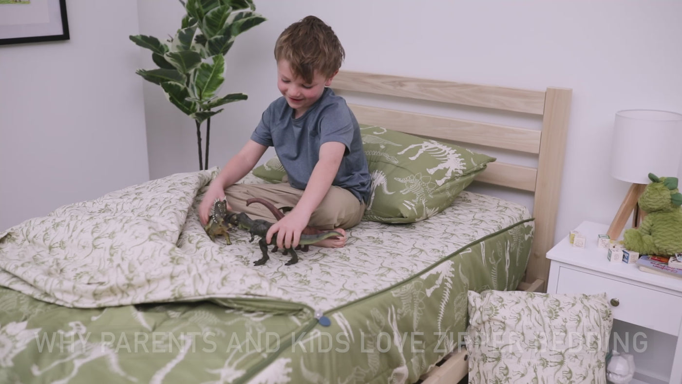 A video highlighting olive green dinosaur fossils kids bedding and it's unique functionalities.