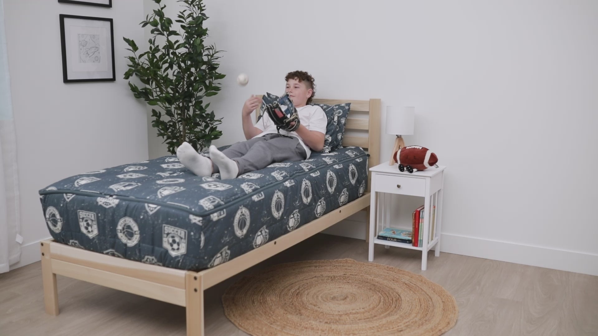 A video highlighting blue sports themed kids bedding and it's unique functionalities.