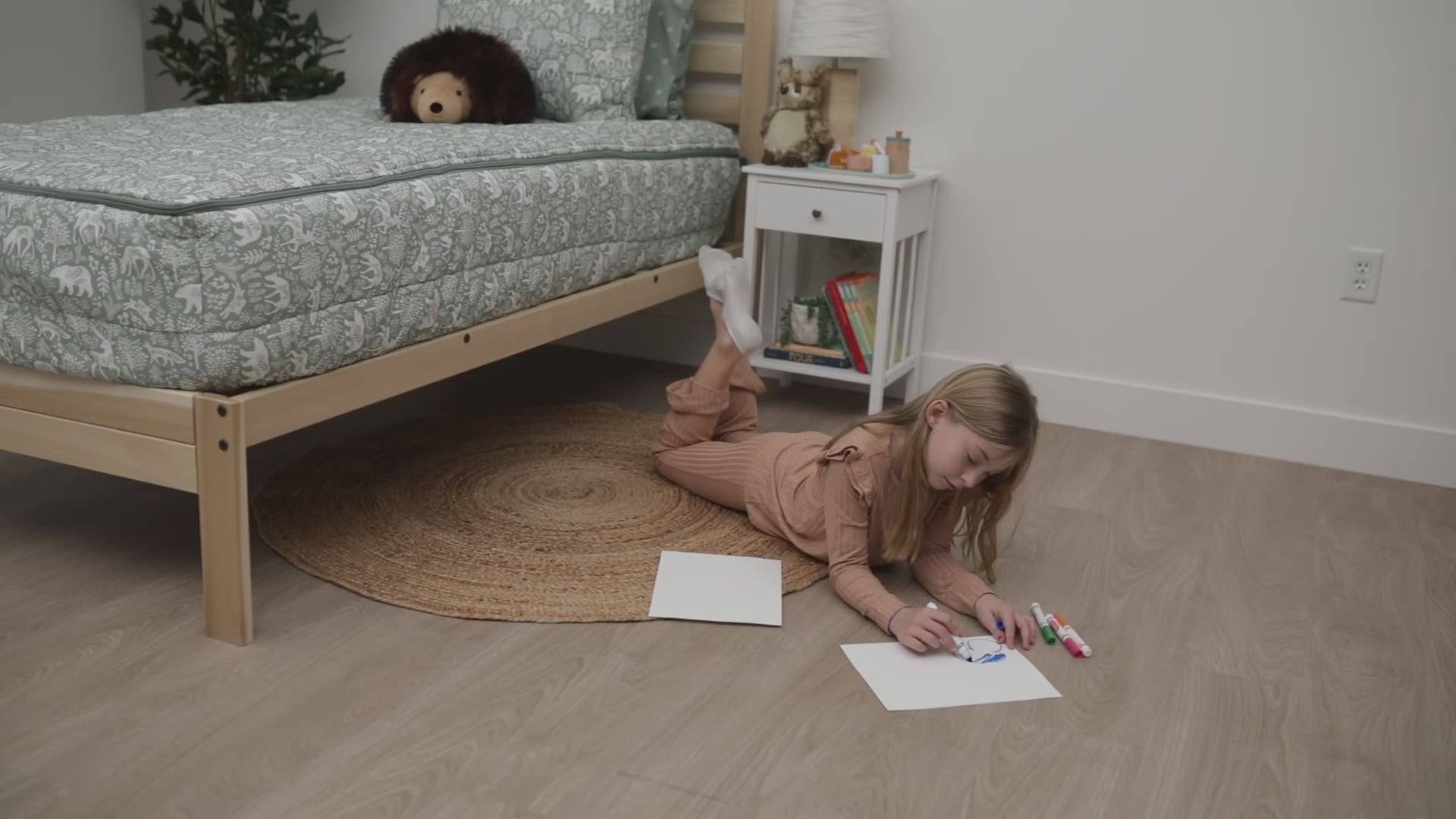 A video highlighting sage green woodland themed kids bedding and it's unique functionalities.