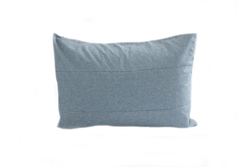 A light blue sham pillow.