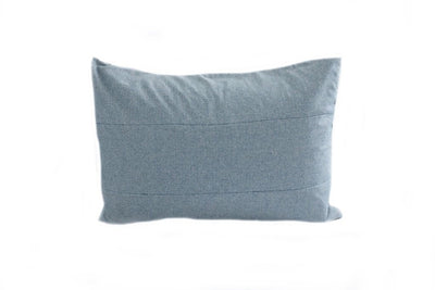 A light blue sham pillow.