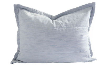 A light blue sham pillow.