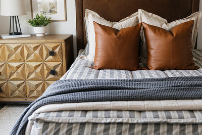 Classic stripe with calming neutrals zipper bedding with tan, gray and rustic accessories.