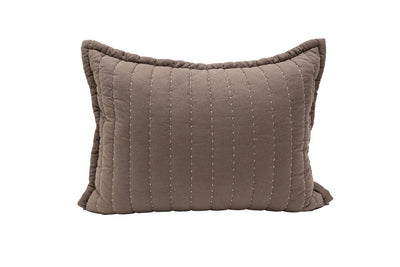 A brown stitched bedding sham