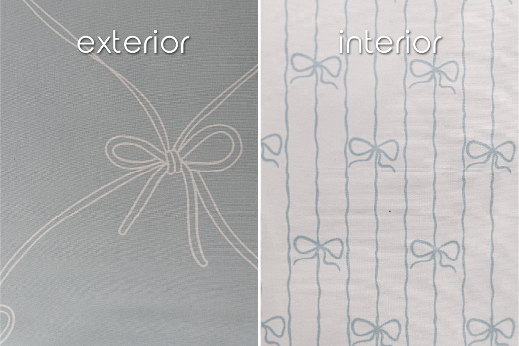 A close up of the exterior and interior fabrics of a set of bows zipper bedding, showcasing the large and small bow prints.