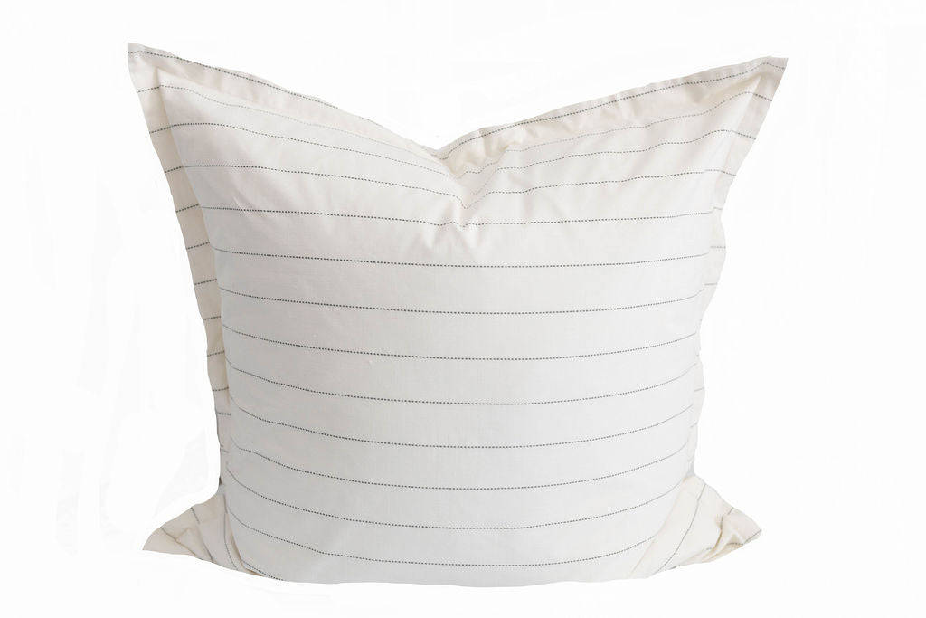A cream green stitched striped large pillow on a white background.