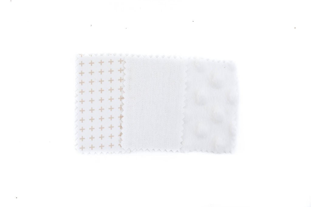 White and cream close up of zipper bedding fabric sample