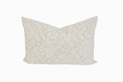 White and cream lumbar pillow with floral design 