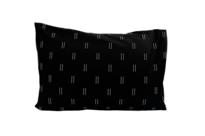 Black pillow case with two white lines in pattern