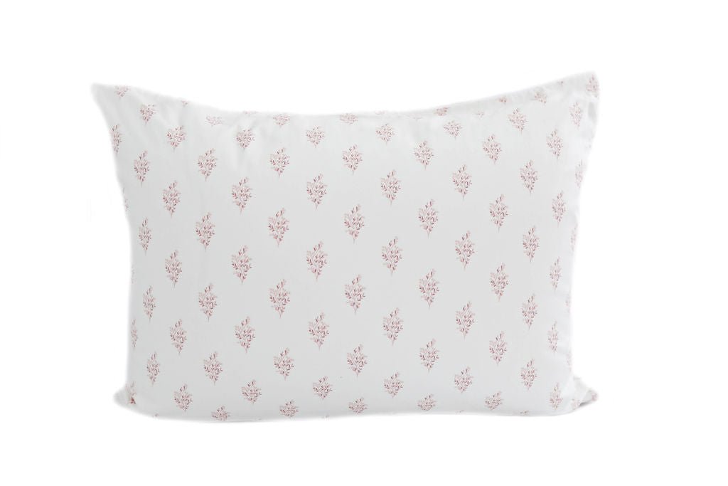 White pillowcase with pink flower pattern design 